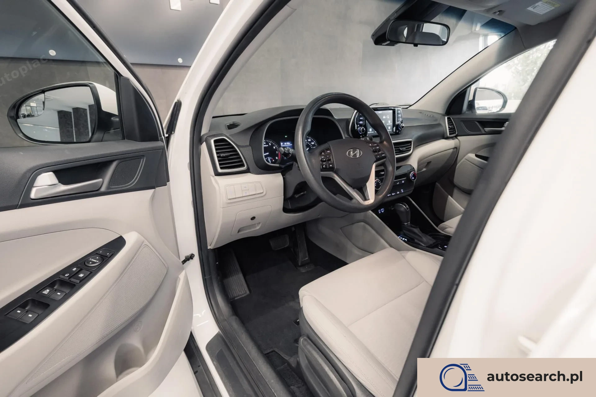 Hyundai Tucson 2.0 GDi HTRAC - zdjęcie 9
