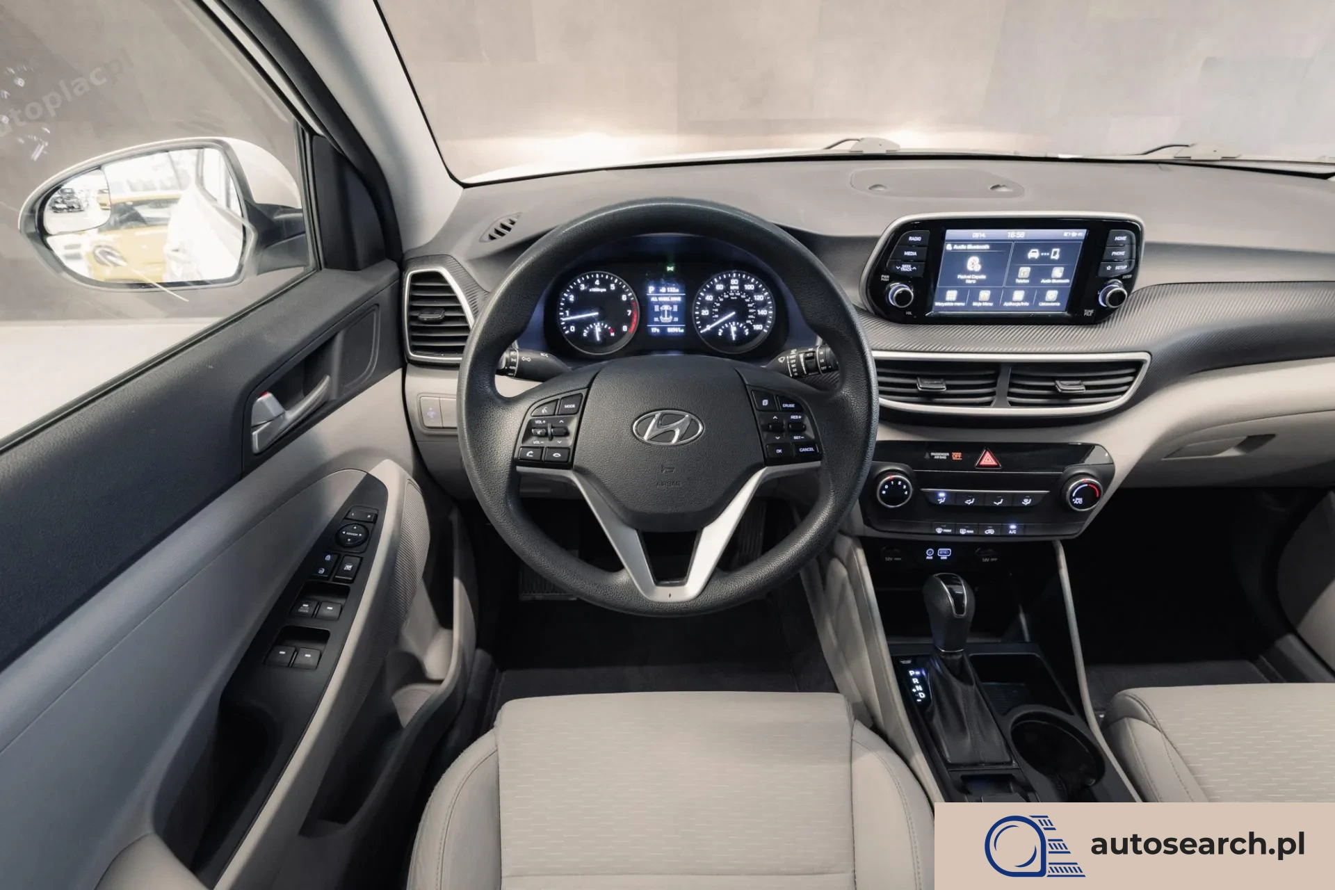 Hyundai Tucson 2.0 GDi HTRAC - zdjęcie 11