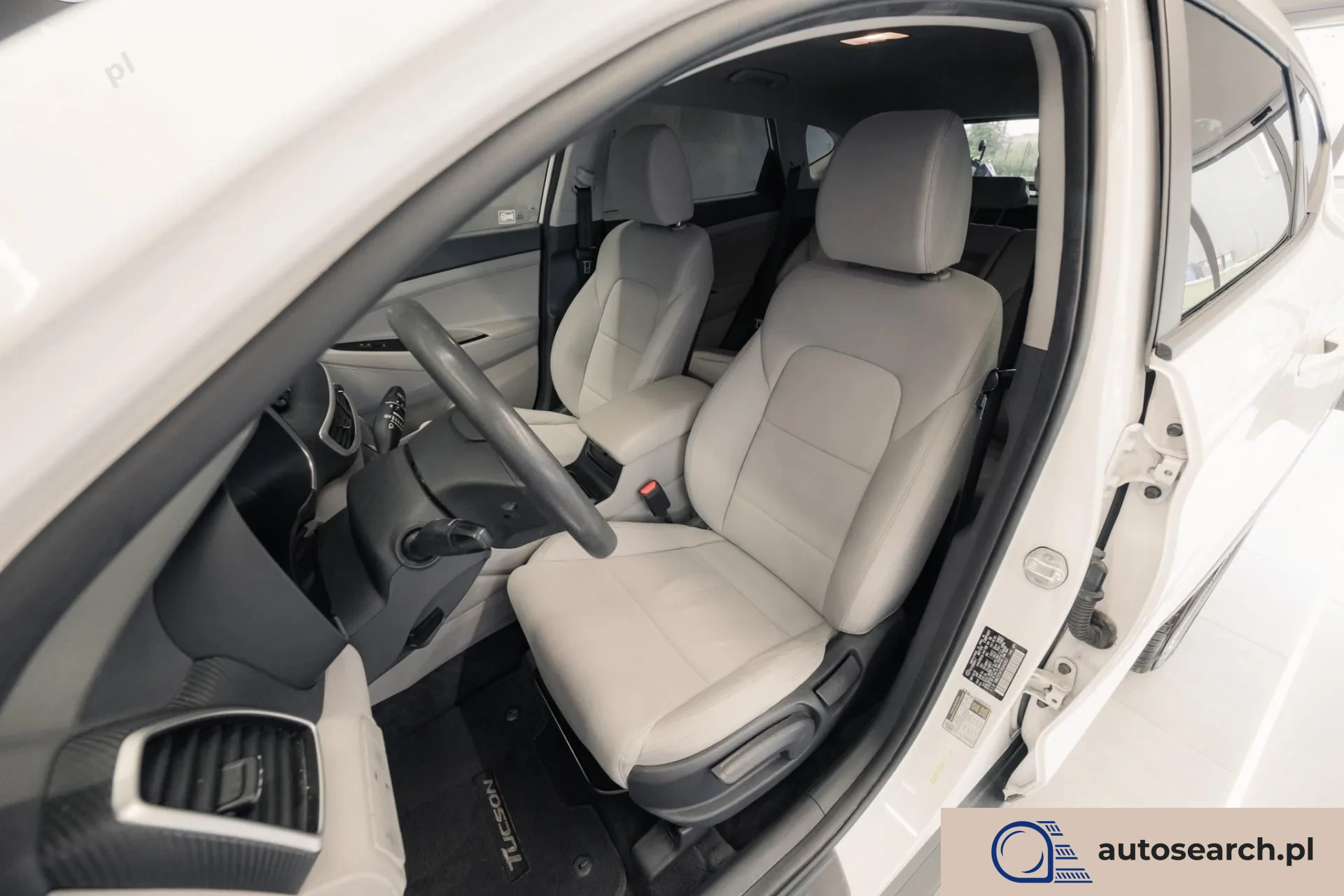 Hyundai Tucson 2.0 GDi HTRAC - zdjęcie 12