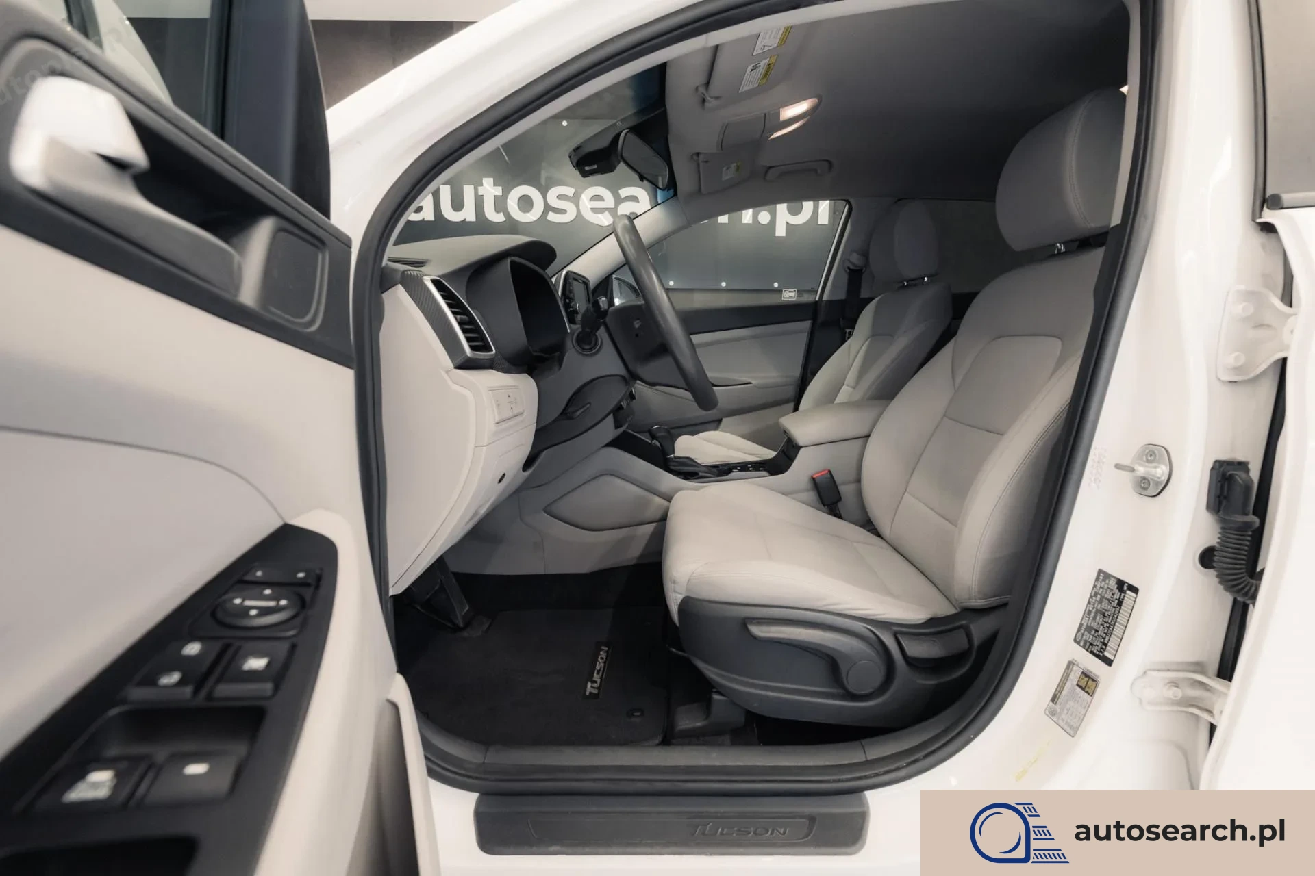 Hyundai Tucson 2.0 GDi HTRAC - zdjęcie 13