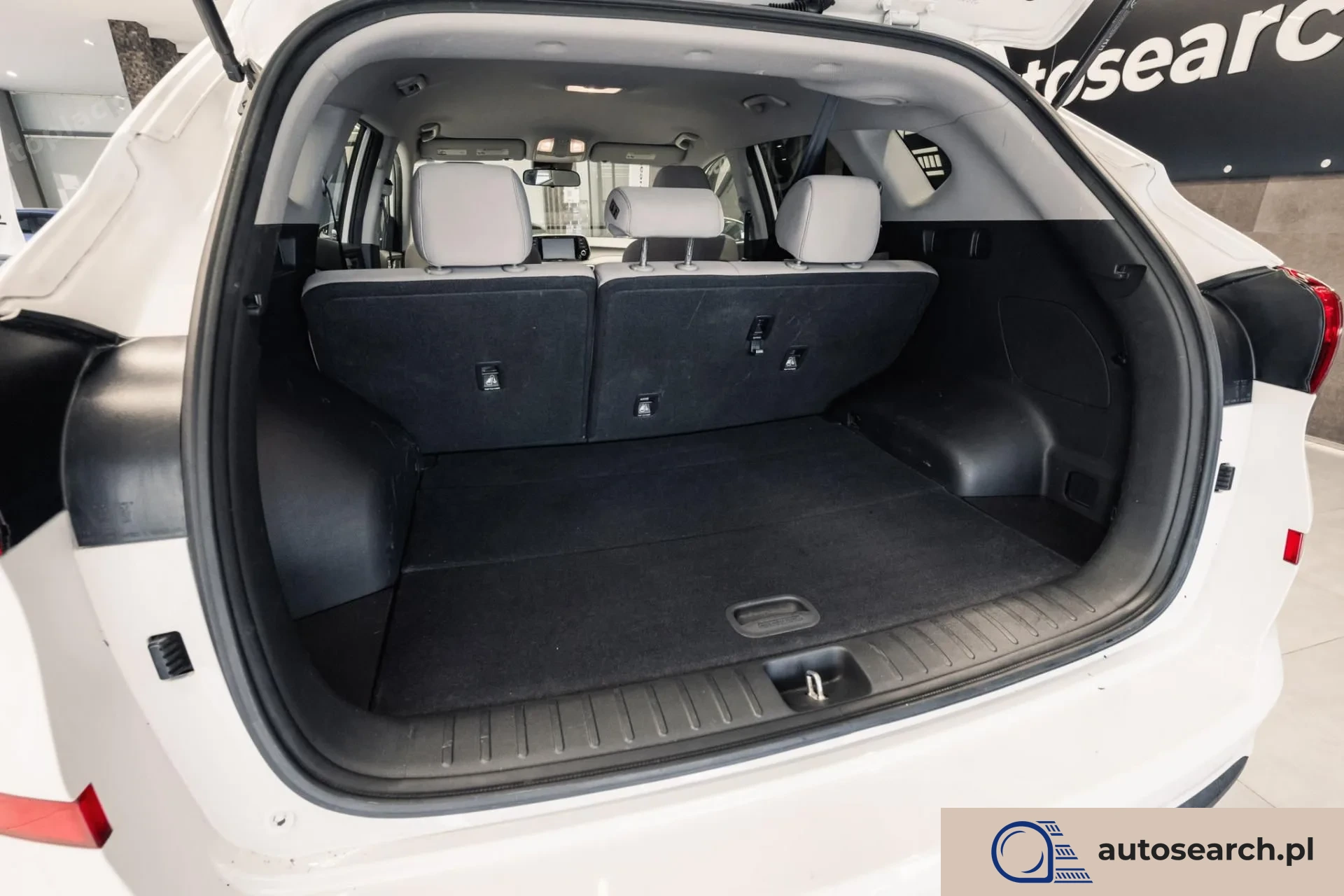 Hyundai Tucson 2.0 GDi HTRAC - zdjęcie 30